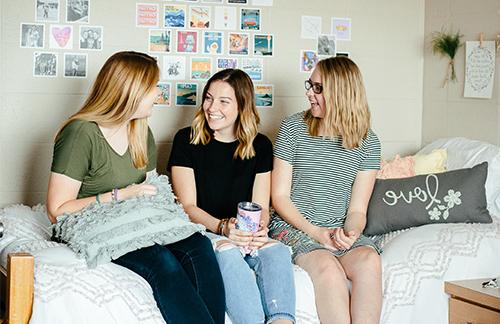 students in dorm room